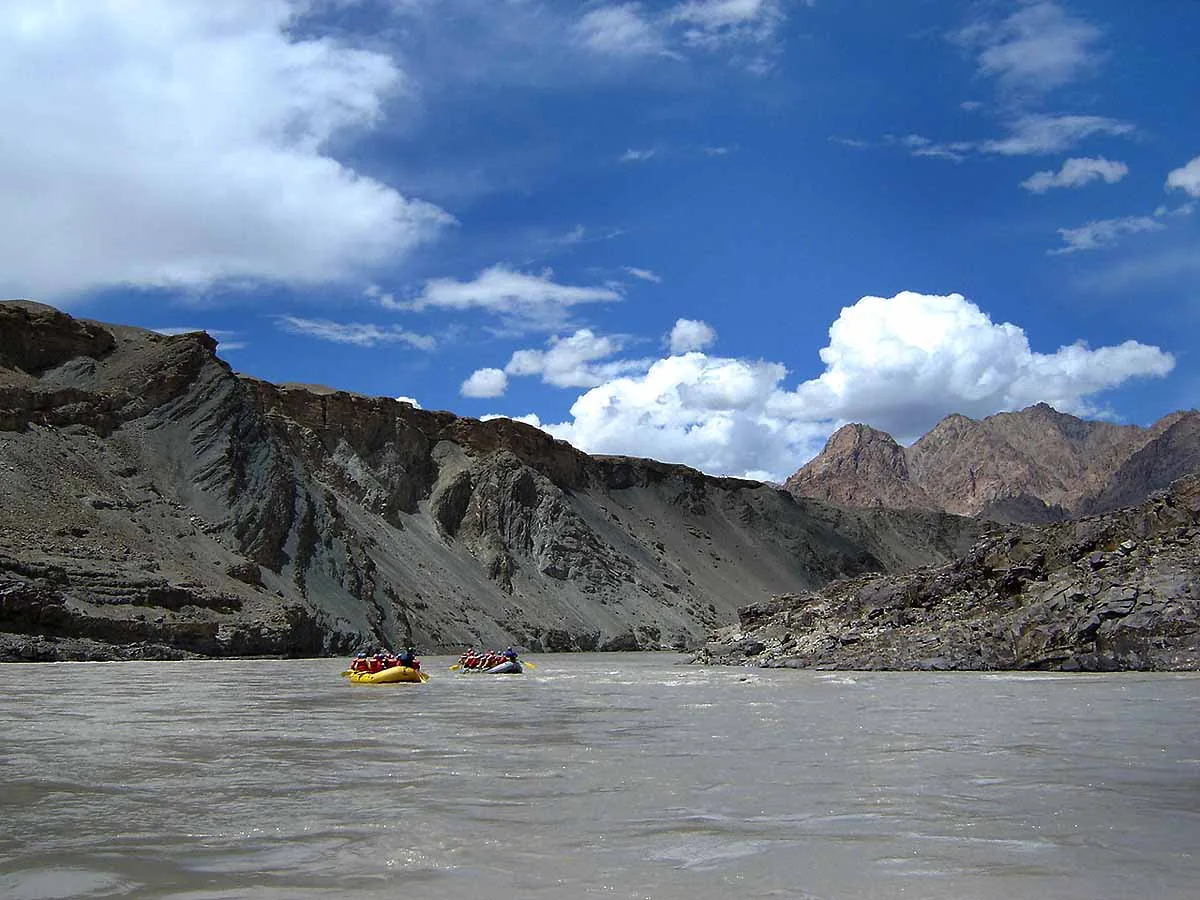 Dramatic vertical granite canyon walls of the roaring Zanskar River along the route to Chilling village