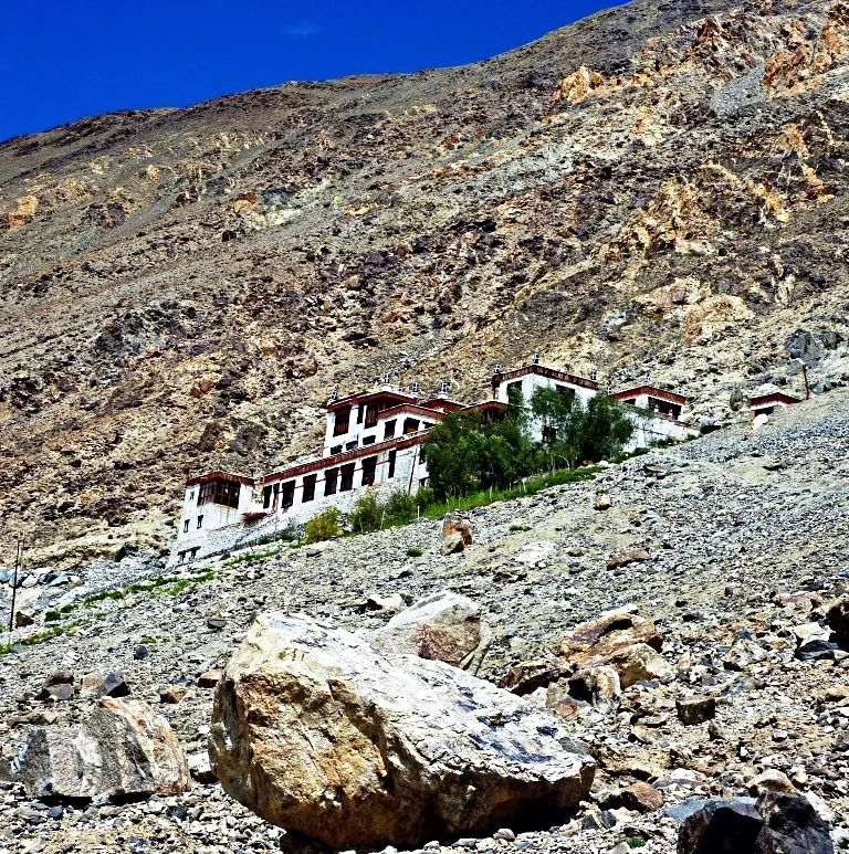 Chumathang natural boiling sulfur thermal hot springs steaming along the banks of the Indus river in Ladakh