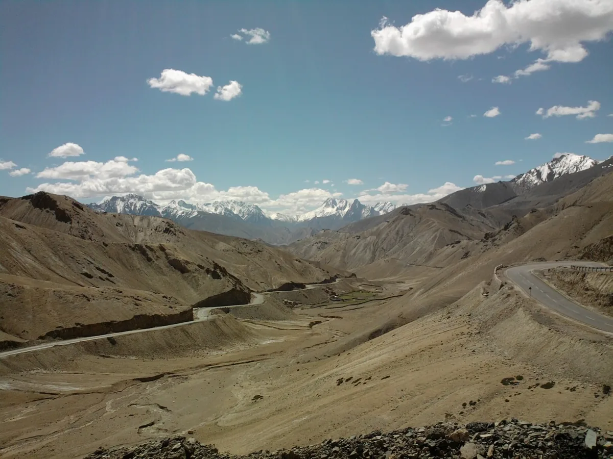 Fotu La pass summit at 13,478 feet on the Srinagar-Leh highway NH1 with colorful Buddhist prayer flags