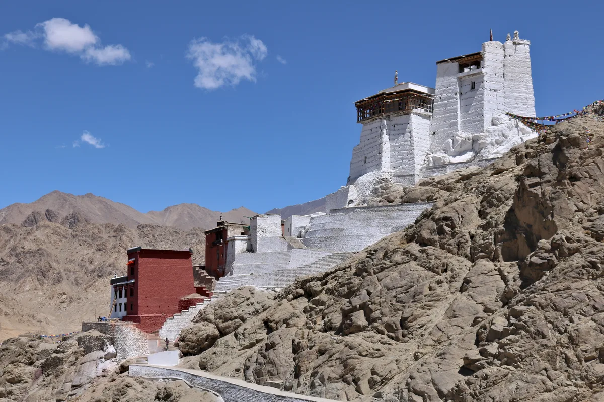 Namgyal Tsemo Gompa and fortress ruins perched dramatically on the rocky mountain ridge above Leh Palace