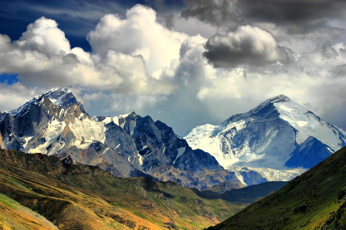 Breathtaking towering 7,000-meter snow peaks of Mount Nun and Kun rising above Panikhar in Suru Valley