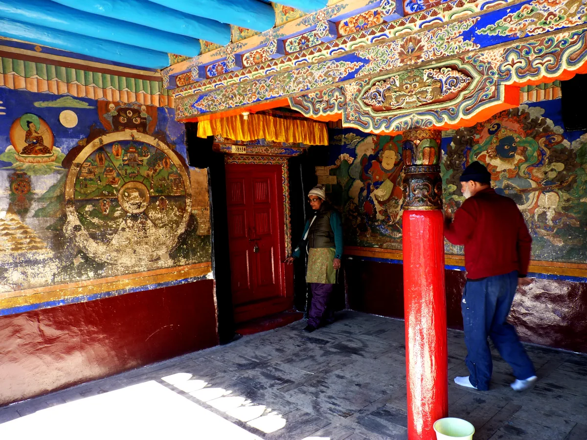 Whitewashed facade and ornate prayer hall entrance of Sankar Gompa in upper Leh