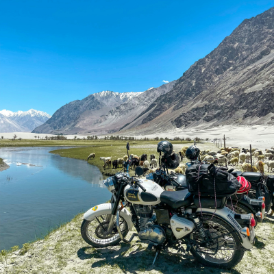 bikes along the indus river during ladakh tour